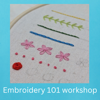 An embroidery hoop with basic embroidery stitches displayed, including straight stitches and decorative flowers, with the text 'Embroidery 101 workshop' added at the bottom.