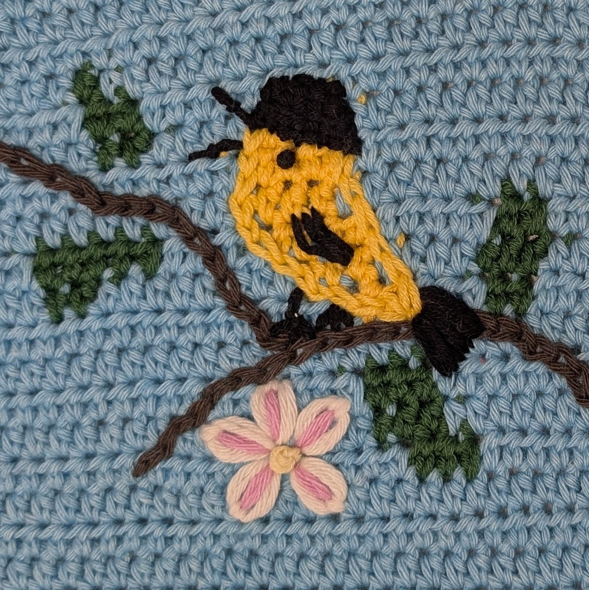 Tapestry crochet & surface decoration | Maud Lewis Yellow Birds sweater