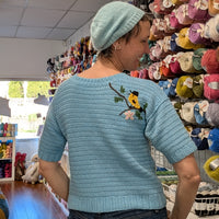 Tapestry crochet & surface decoration | Maud Lewis Yellow Birds sweater