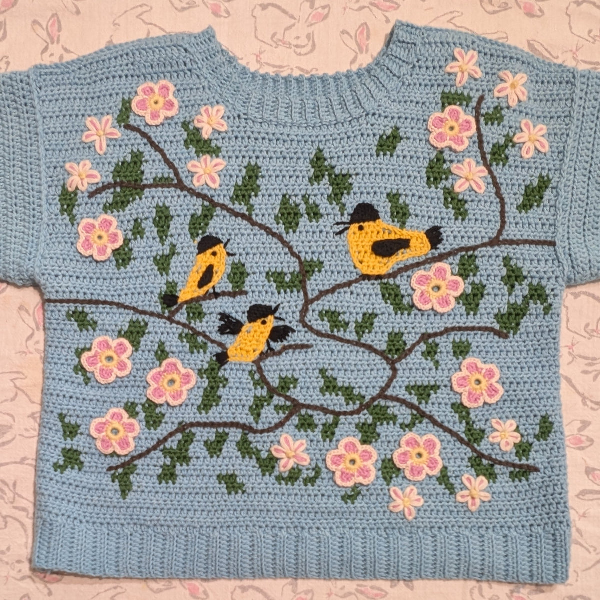 Tapestry crochet & surface decoration | Maud Lewis Yellow Birds sweater