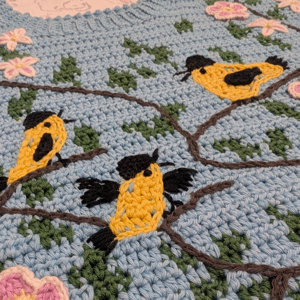 Tapestry crochet & surface decoration | Maud Lewis Yellow Birds sweater